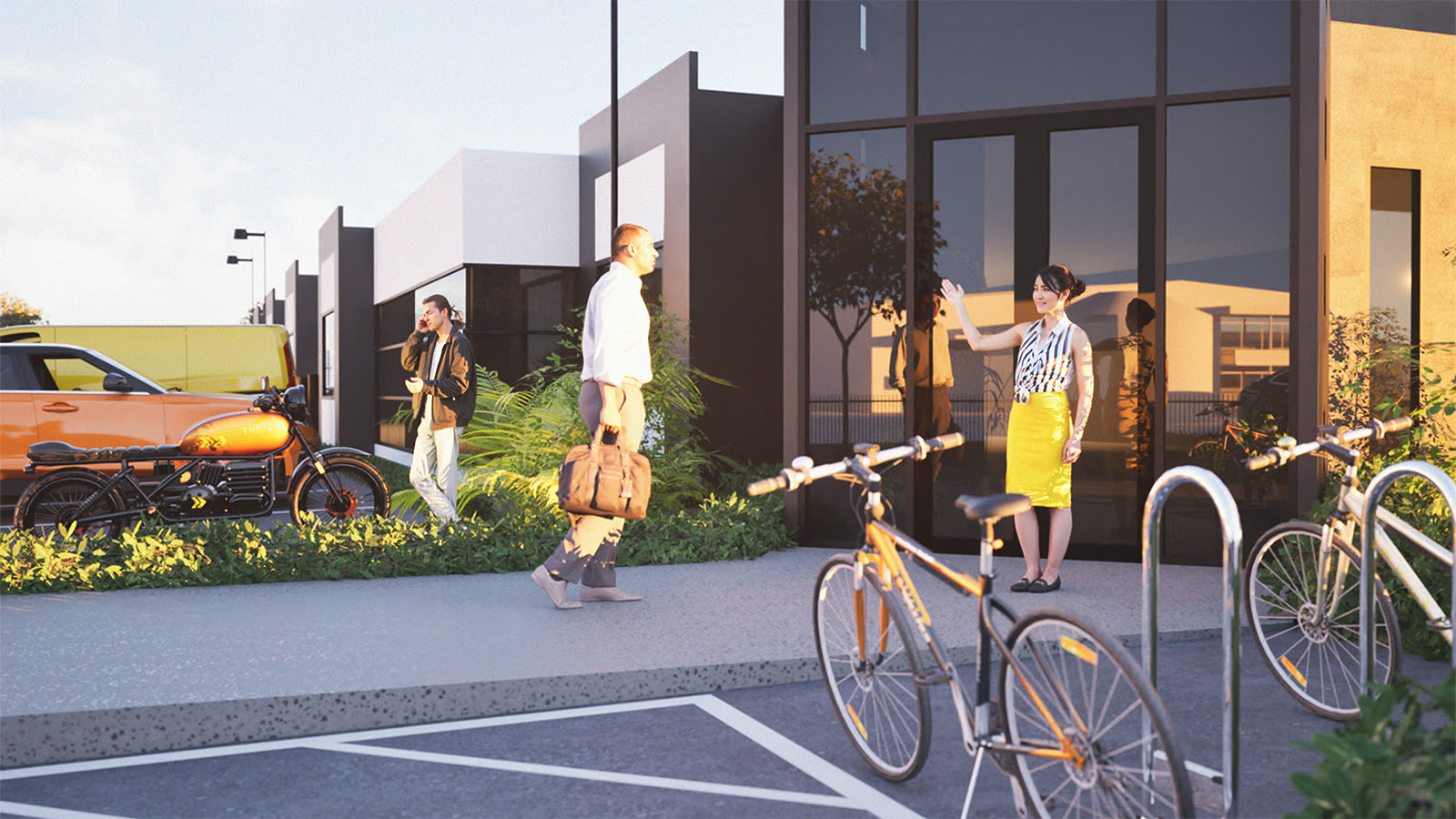 The office entry with bike racks and planting, staff arriving
