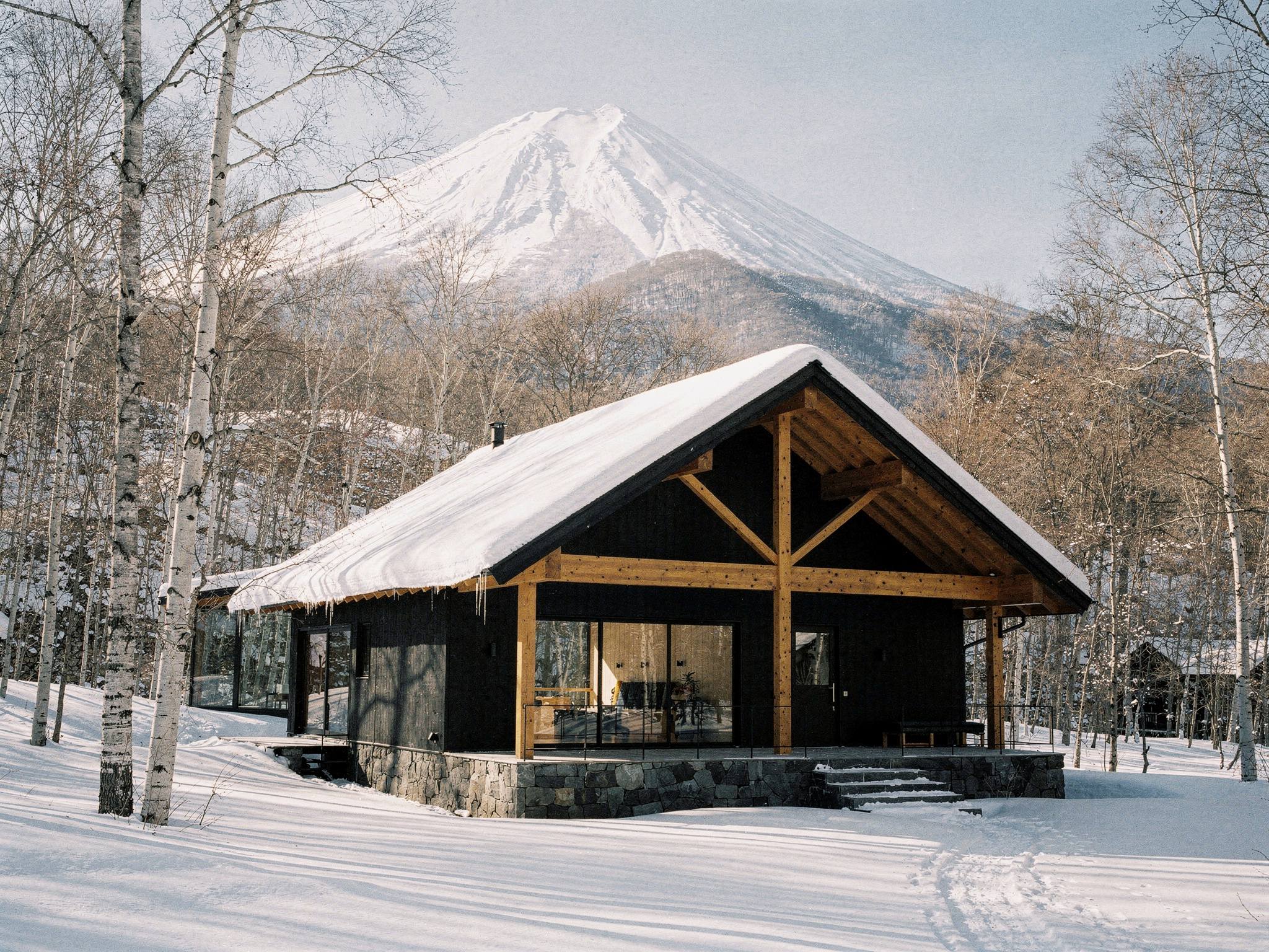 Alpine Lodge Collection — charred cedar lodge in the Niseko snow