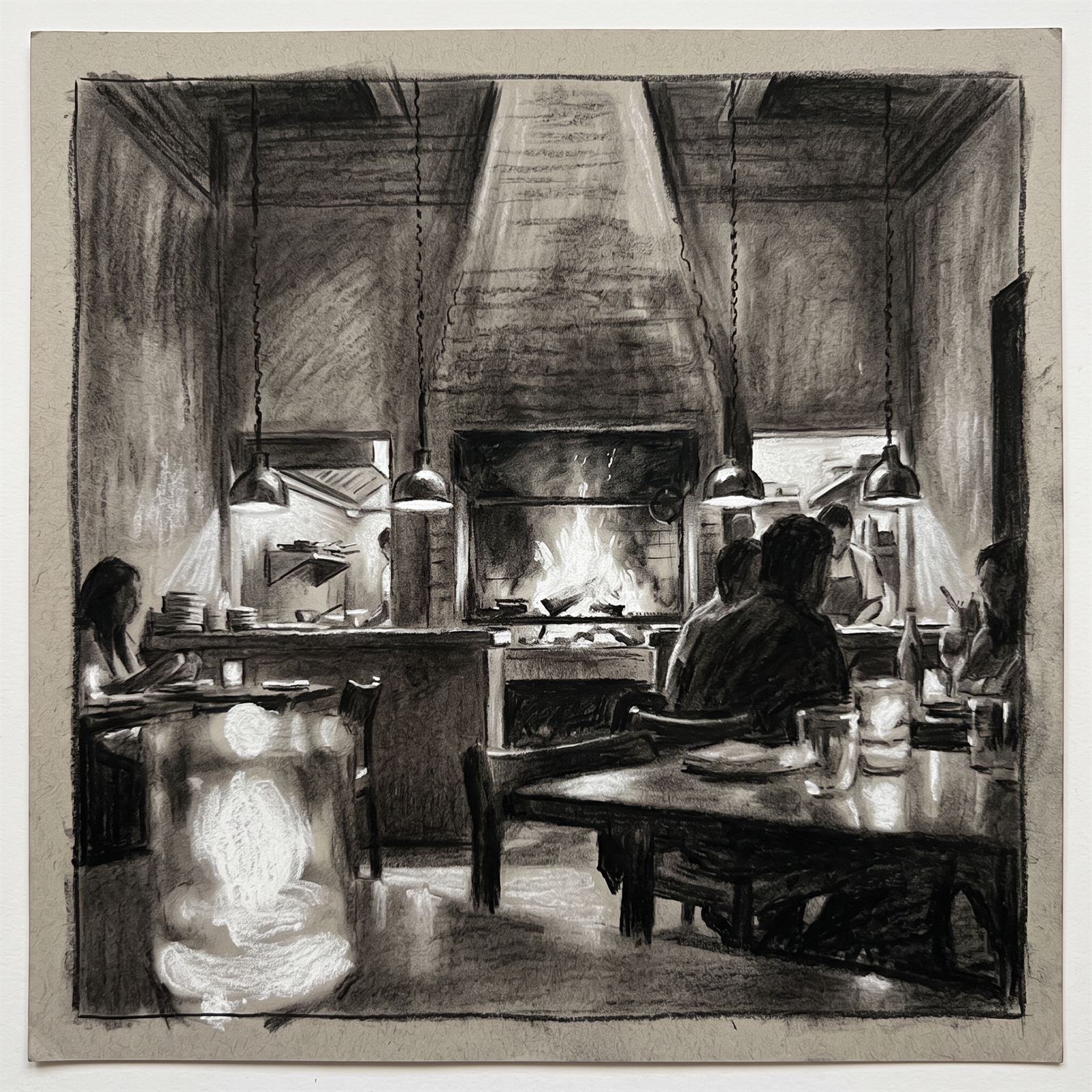 Charcoal light study — the brass pendants and the fire as the only light sources at service