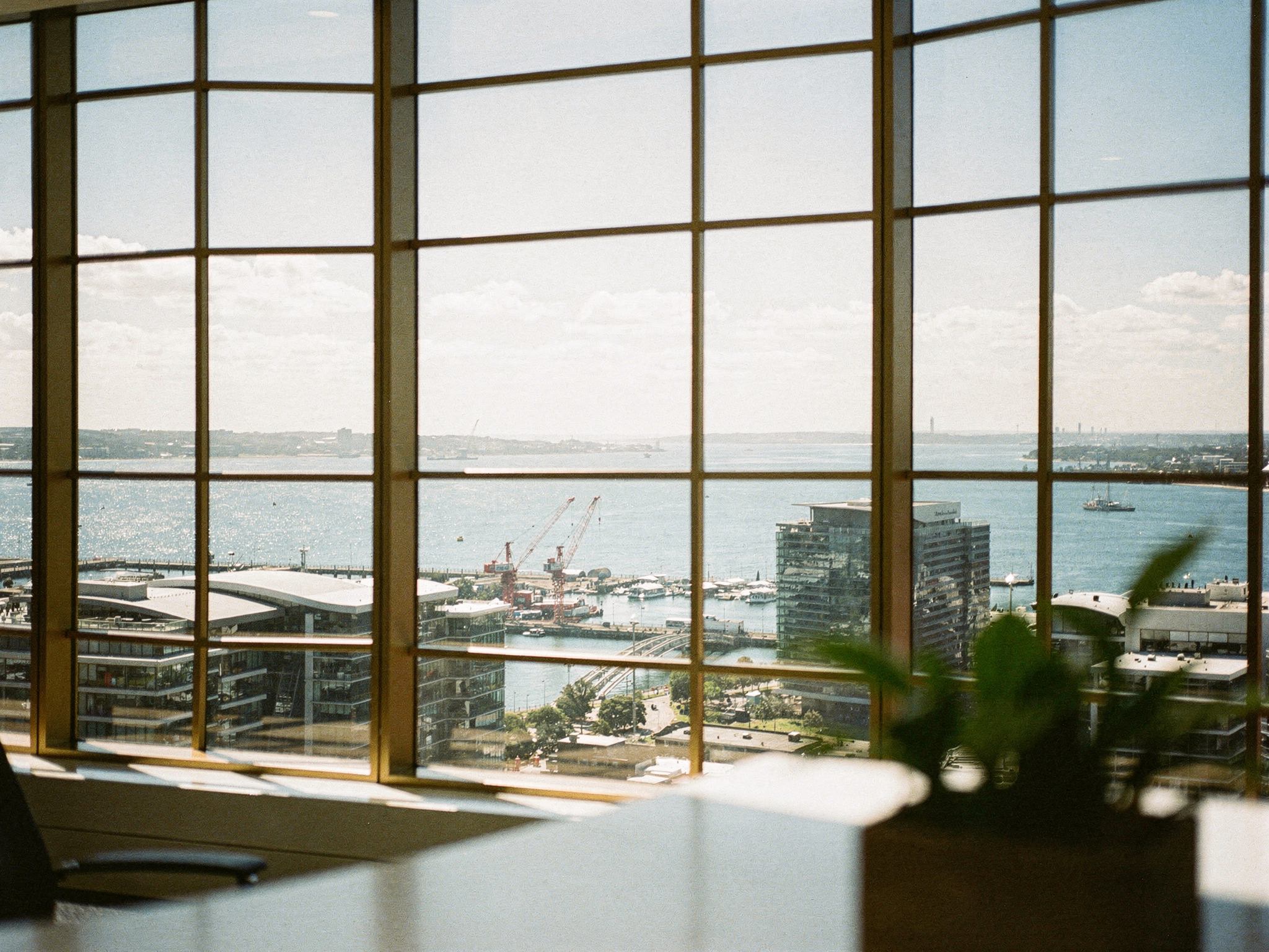 View from a high office floor over Melbourne's Docklands and the bay